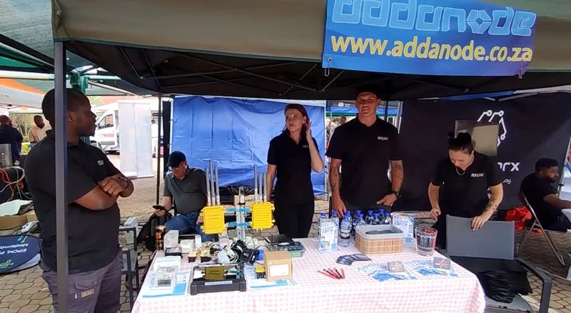 The addanode and partner team behind the demo table at the booth
