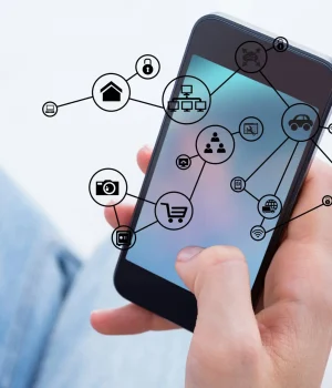 digital composite of hand holding smartphone with vignettes